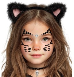 Crystal face sticker in the shape of a cat with glittering rhinestones arranged to depict a cat's face on a girl's face