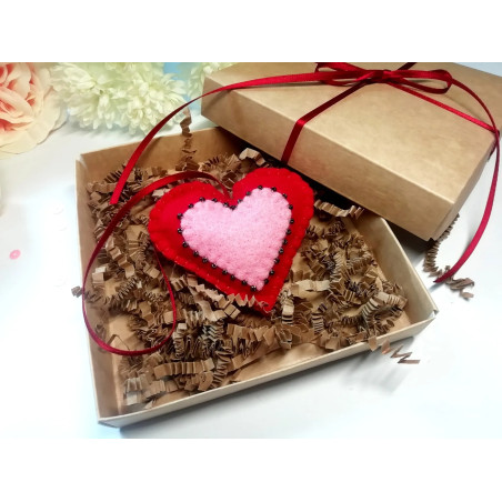 Heart with beads in a gift box